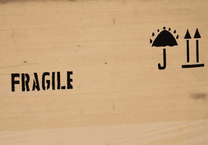 A crate marked with a stamp saying fragile.png